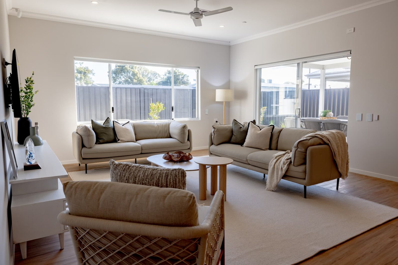 Living room and open plan living area in one of the Kenwick SDA homes