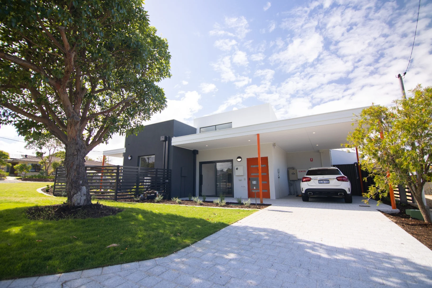 Pulse Barnsbury SDA home in Perth Western Australia with accessible carport, level paved driveway and landscaped garden